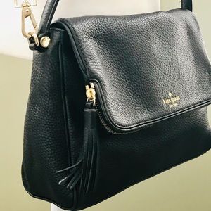 Kate spade Crossbody bag with tassel.